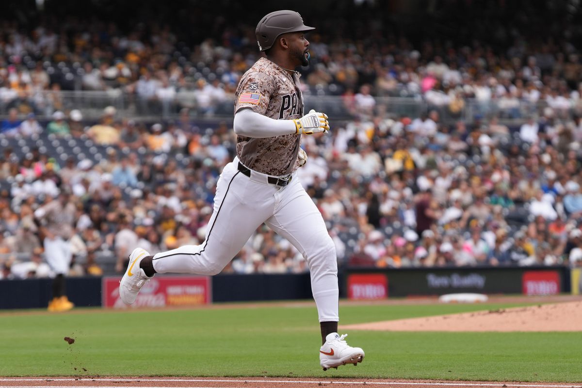 Padres third baseman Miguel Andujar (41) runs to first base during an MLB baseball game against the White Sox, Sunday May 03, 2026 in San Diego, California.