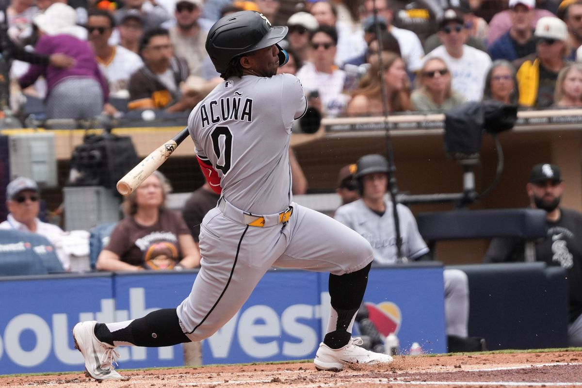 White Sox center fielder Luisangel Acuna (0) hits the ball during an MLB baseball game against the Padres, Sunday May 03, 2026 in San Diego, California.