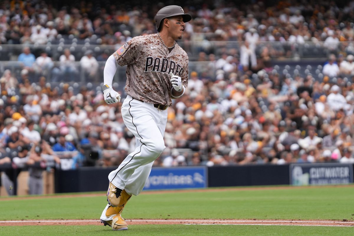 Padres third baseman Manny Machado (13) runs to first base during an MLB baseball game against the White Sox, Sunday May 03, 2026 in San Diego, California.