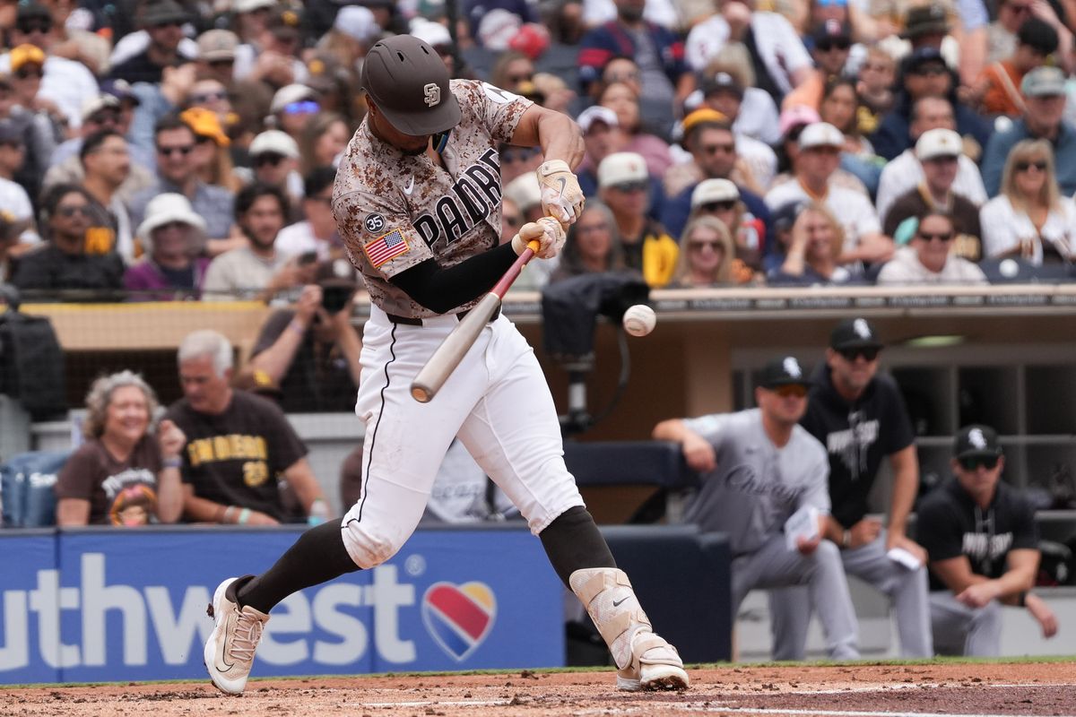 Padres shortstop Xander Bogaerts (2) hits the ball during an MLB baseball game against the White Sox, Sunday May 03, 2026 in San Diego, California.