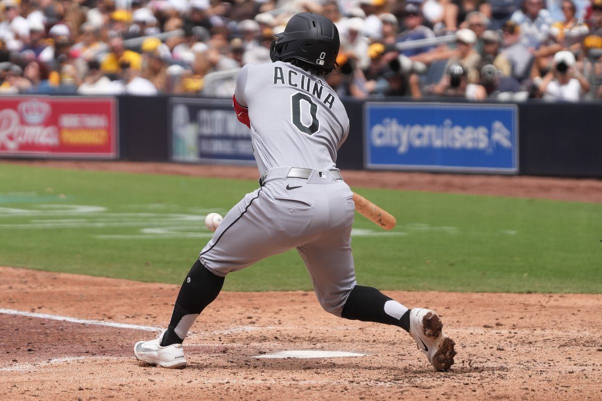White Sox center fielder Luisangel Acuna (0) swings and misses the ball during an MLB baseball game against the Padres, Sunday May 03, 2026 in San Diego, California.