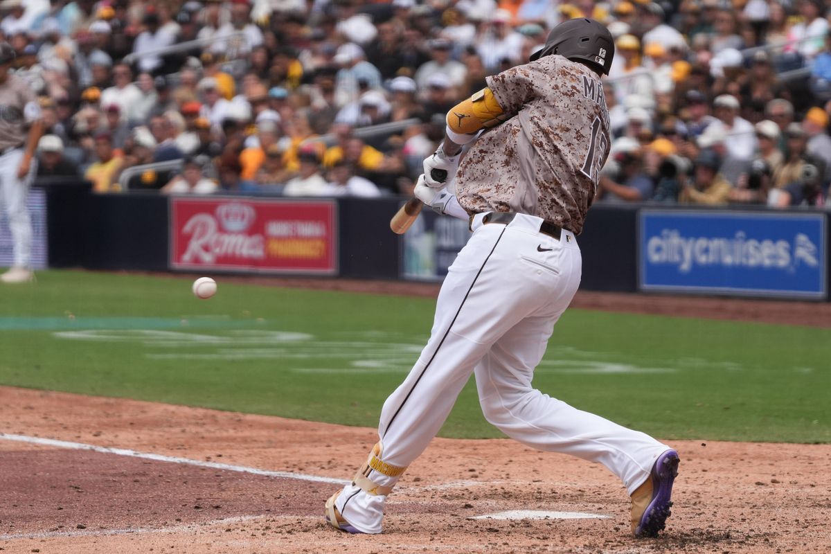 Padres third baseman Manny Machado (13) swings the bat during an MLB baseball game against the White Sox, Sunday May 03, 2026 in San Diego, California.