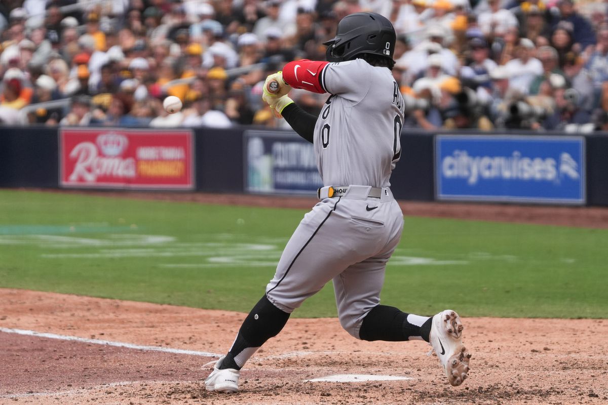 White Sox center fielder Luisangel Acuna (0) hits the ball during an MLB baseball game against the Padres, Sunday May 03, 2026 in San Diego, California.