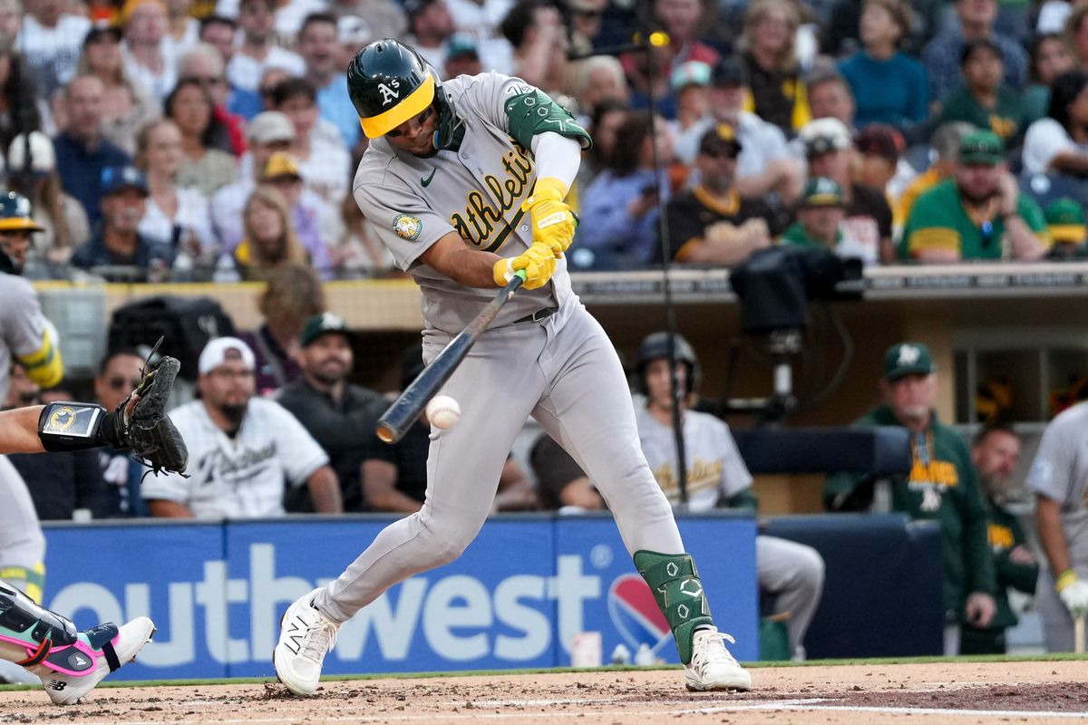 Athletics third baseman Darell Hernaiz (2) hits the ball during an MLB baseball game against the Padres, Friday May 22, 2026 in San Diego, California.