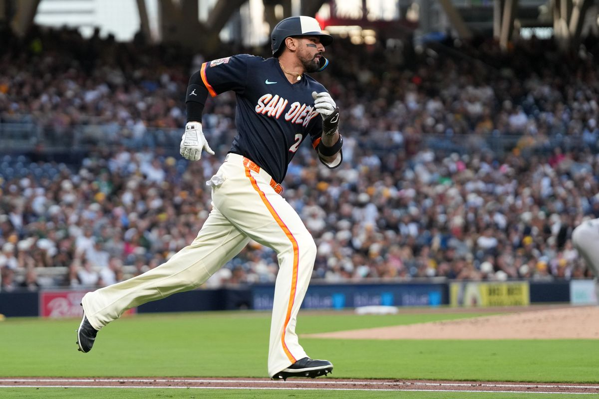 Padres right fielder Nick Castellanos (21) runs to first base during an MLB baseball game against the Athletics, Friday May 22, 2026 in San Diego, California.