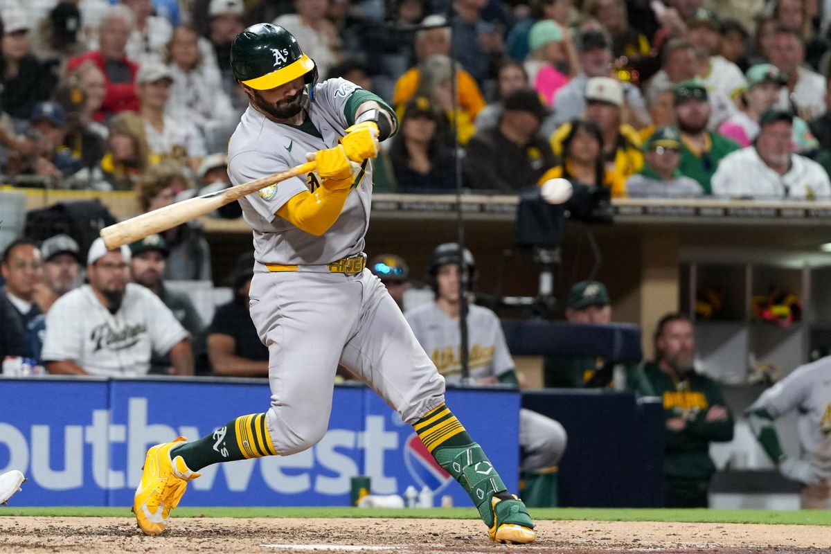 Athletics catcher Shea Langeliers (23) hits the ball during an MLB baseball game against the Padres, Friday May 22, 2026 in San Diego, California.