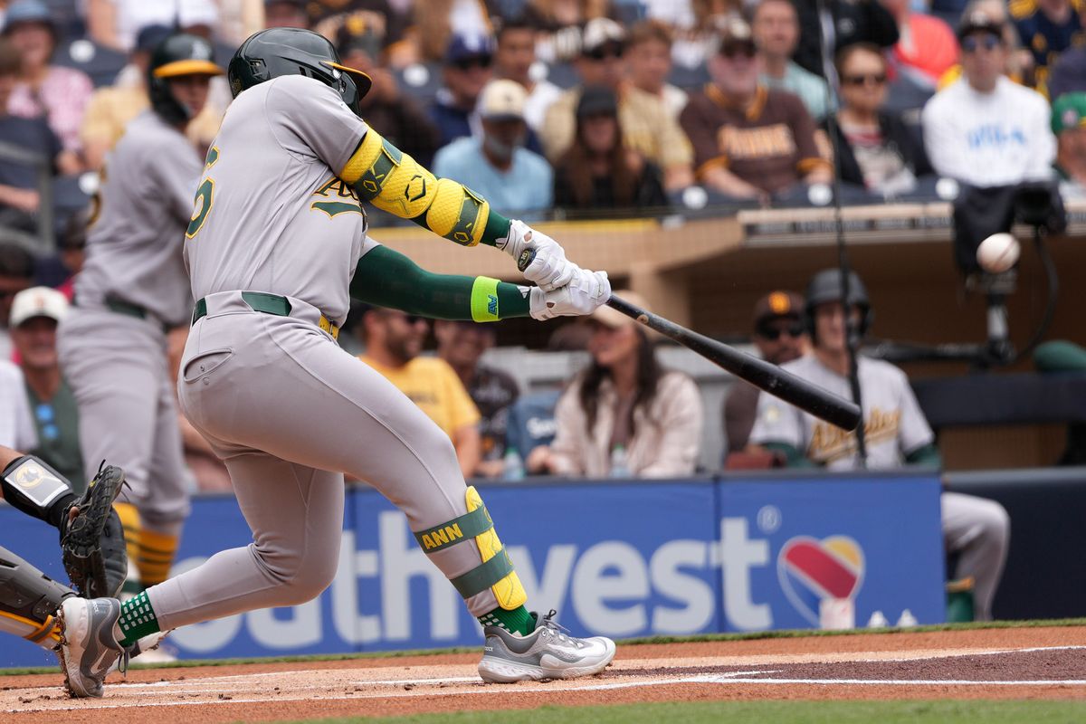 Athletics right fielder Carlos Cortes (26) hits a home run during an MLB baseball game against the Padres, Sunday May 24, 2026 in San Diego, California. Athletics right fielder Carlos Cortes (26) hits a home run during an MLB baseball game against the Padres, Sunday May 24, 2026 in San Diego, California.