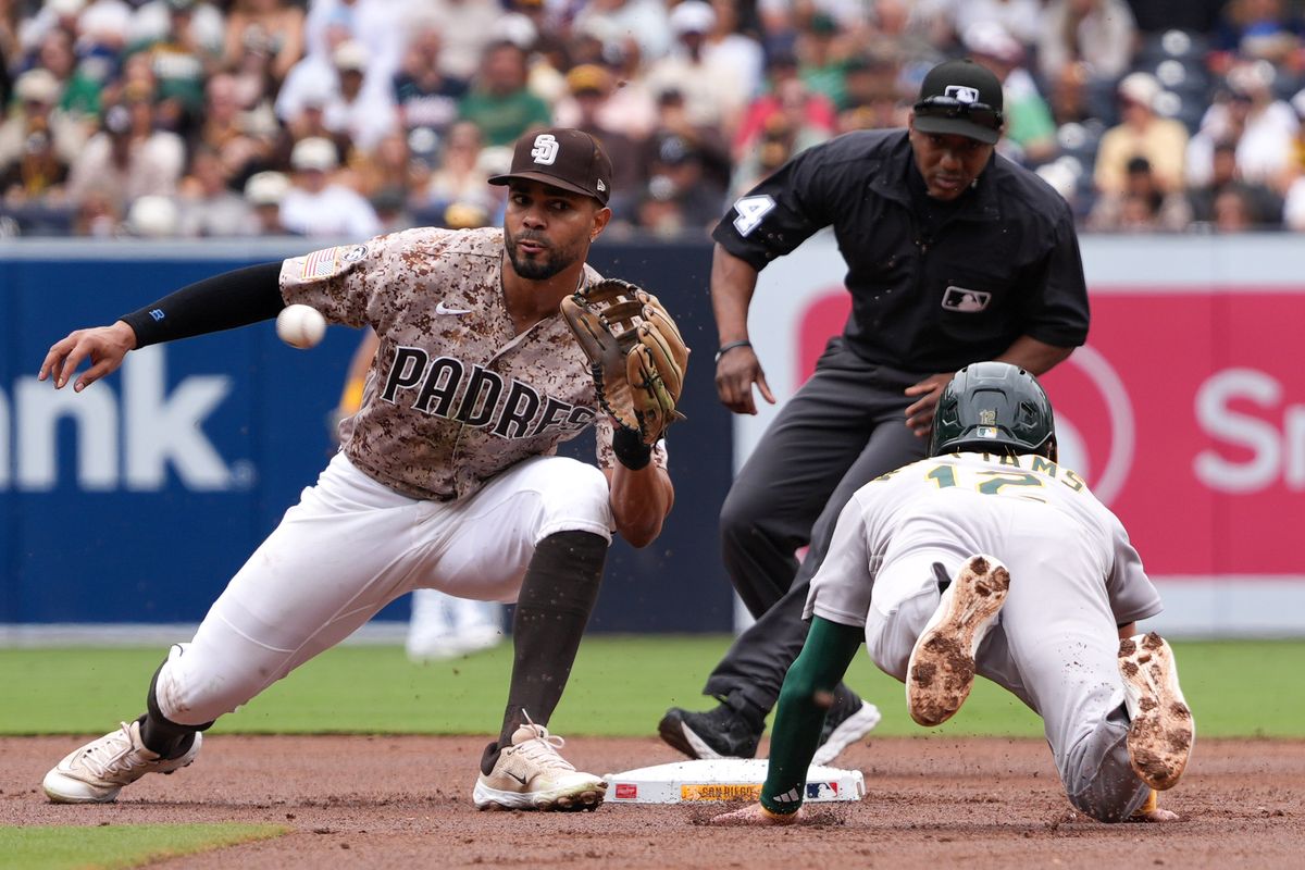 Athletics second baseman Alika Williams (12) slides to second base during an MLB baseball game against the Padres, Sunday May 24, 2026 in San Diego, California. Athletics second baseman Alika Williams (12) slides to second base during an MLB baseball game against the Padres, Sunday May 24, 2026 in San Diego, California.