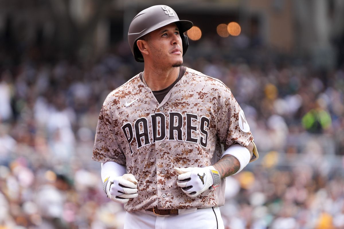 Padres third baseman Manny Machado (13) watches his hit get caught during an MLB baseball game against the Athletics, Sunday May 24, 2026 in San Diego, California. Padres third baseman Manny Machado (13) watches his hit get caught during an MLB baseball game against the Athletics, Sunday May 24, 2026 in San Diego, California.
