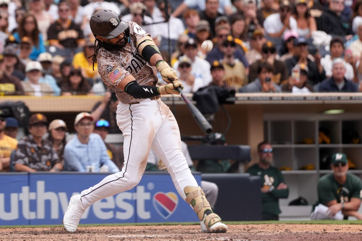 Padres right fielder Fernando Tatis Jr. (23) hits the ball during an MLB baseball game against the Athletics, Sunday May 24, 2026 in San Diego, California. Padres right fielder Fernando Tatis Jr. (23) hits the ball during an MLB baseball game against the Athletics, Sunday May 24, 2026 in San Diego, California.