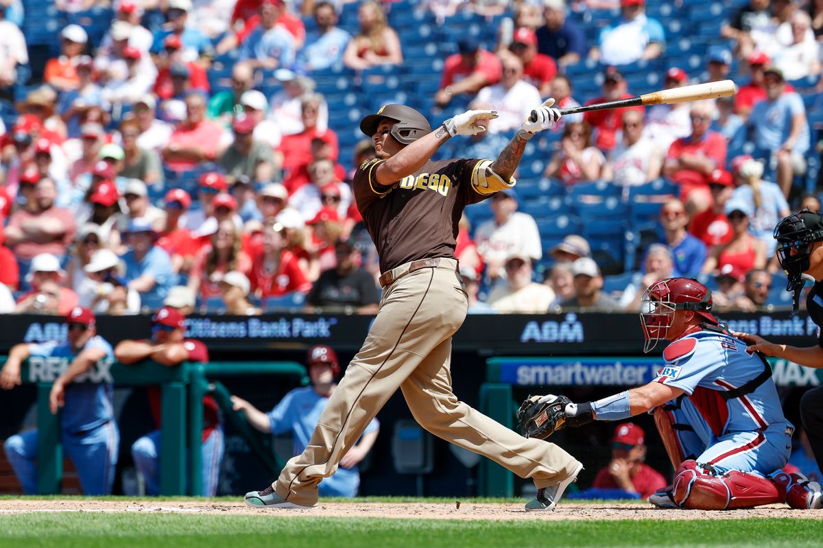 Manny Machado #13 of the San Diego Padres hits a home run against the Philadelphia Phillies at Citizens Bank Park on June 2, 2026 in Philadelphia, Pennsylvania.