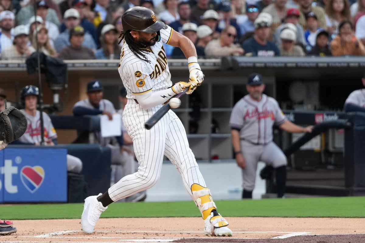 Padres right fielder Fernando Tatis Jr. (23) hits the ball during an MLB baseball game against the Braves, Monday June 22, 2026 in San Diego, California. Padres right fielder Fernando Tatis Jr. (23) hits the ball during an MLB baseball game against the Braves, Monday June 22, 2026 in San Diego, California.