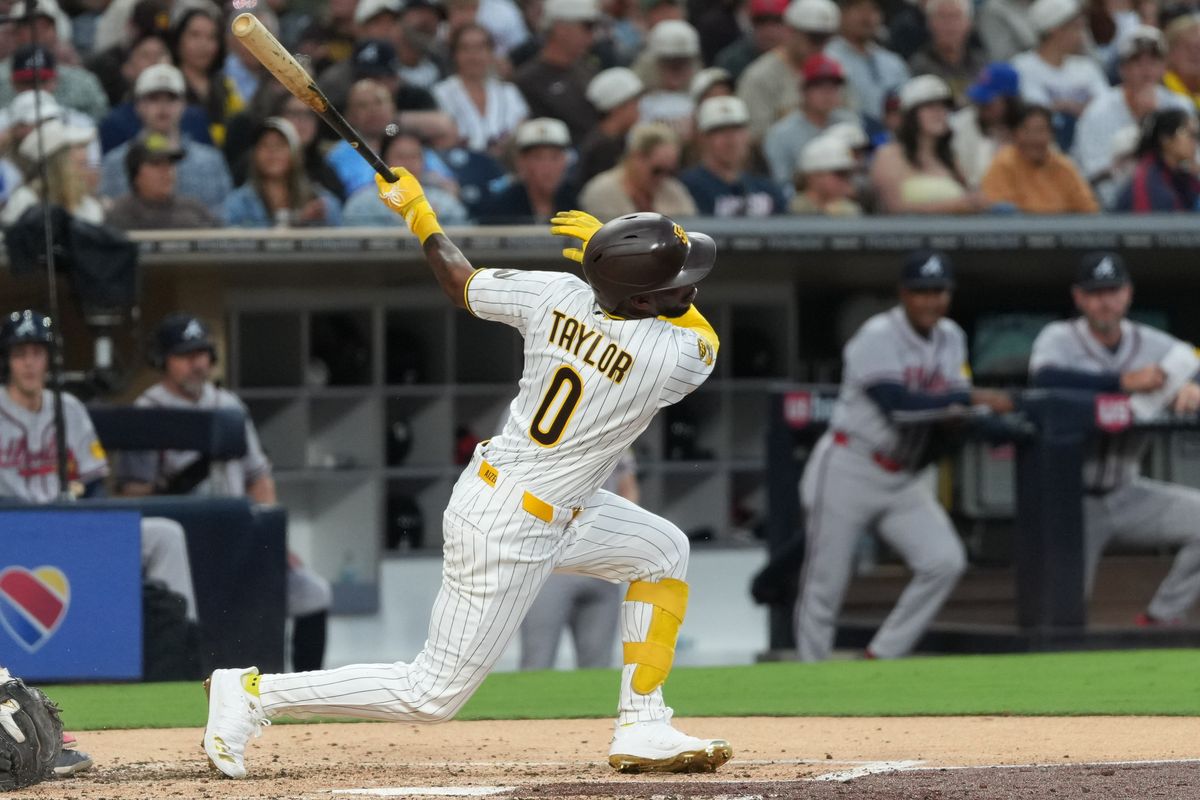 Padres left fielder Samad Taylor (0) strikes out during an MLB baseball game against the Braves, Monday June 22, 2026 in San Diego, California. Padres left fielder Samad Taylor (0) strikes out during an MLB baseball game against the Braves, Monday June 22, 2026 in San Diego, California.