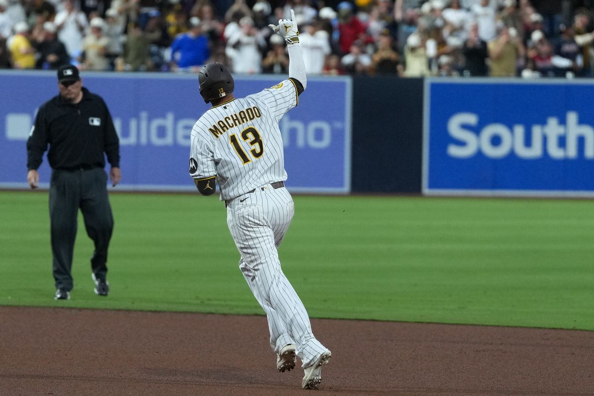 Padres third baseman Manny Machado (13) celebrates after hitting a home run during an MLB baseball game against the Braves, Monday June 22, 2026 in San Diego, California. Padres third baseman Manny Machado (13) celebrates after hitting a home run during an MLB baseball game against the Braves, Monday June 22, 2026 in San Diego, California.