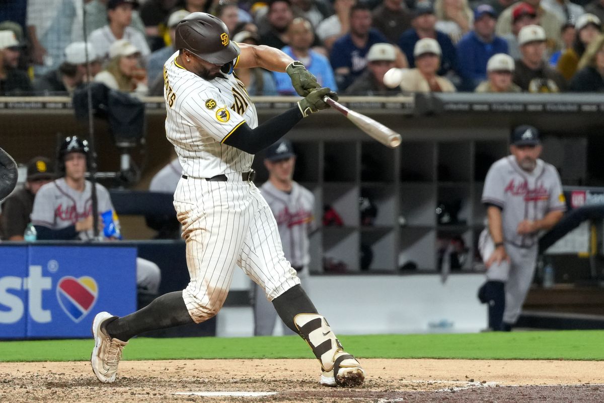 Padres shortstop Xander Bogaerts (2) hits the ball during an MLB baseball game against the Braves, Monday June 22, 2026 in San Diego, California. Padres shortstop Xander Bogaerts (2) hits the ball during an MLB baseball game against the Braves, Monday June 22, 2026 in San Diego, California.
