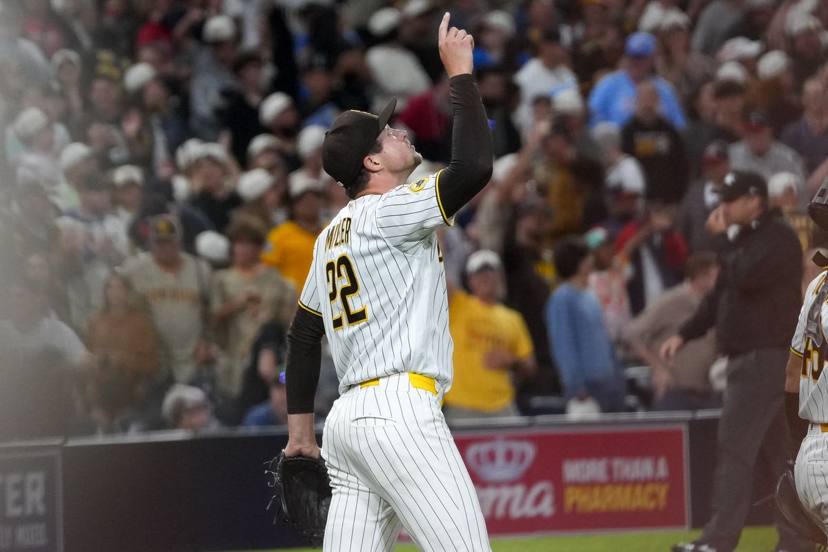 Padres relief pitcher Mason Miller (22) celebrates after striking out a batter during an MLB baseball game against the Braves, Monday June 22, 2026 in San Diego, California. Padres relief pitcher Mason Miller (22) celebrates after striking out a batter during an MLB baseball game against the Braves, Monday June 22, 2026 in San Diego, California.