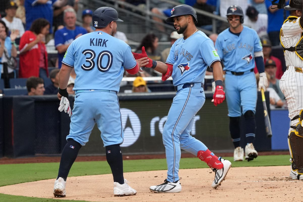 Blue Jays left fielder Jonatan Clase (8) celebrates with Blue Jays catcher Alejandro Kirk (30) after hitting a home run during an MLB baseball game against the Padres, Saturday July 11, 2026 in San Diego, California. Blue Jays left fielder Jonatan Clase (8) celebrates with Blue Jays catcher Alejandro Kirk (30) after hitting a home run during an MLB baseball game against the Padres, Saturday July 11, 2026 in San Diego, California.