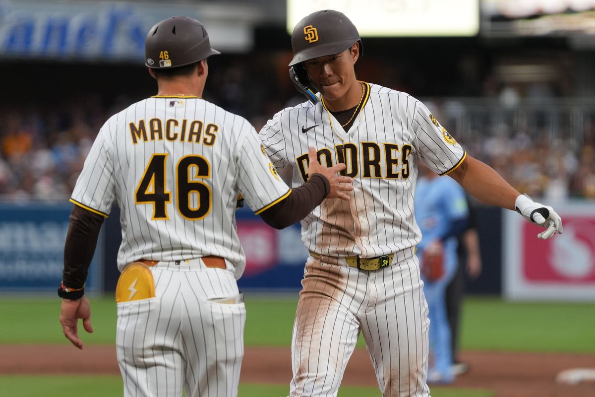Padres third baseman Sung-Mun Song (24) celebrates after getting a hit during an MLB baseball game against the Blue Jays, Saturday July 11, 2026 in San Diego, California. Padres third baseman Sung-Mun Song (24) celebrates after getting a hit during an MLB baseball game against the Blue Jays, Saturday July 11, 2026 in San Diego, California.