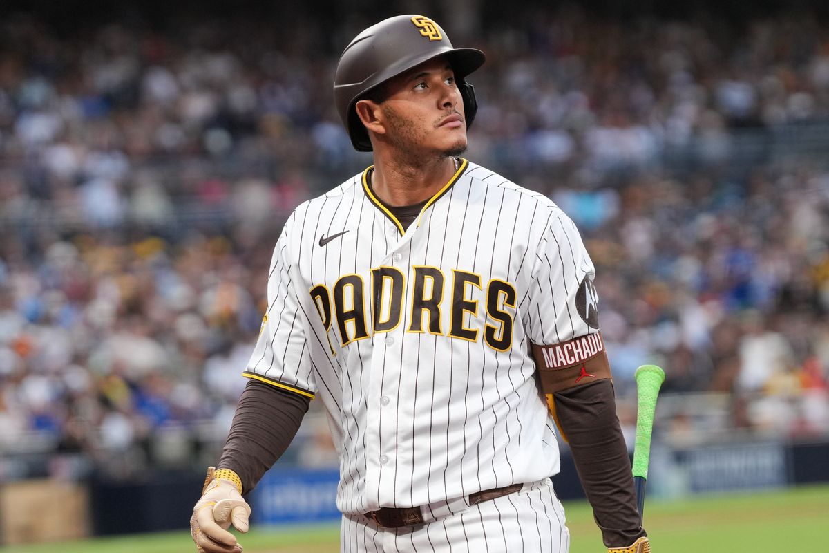 Padres third baseman Manny Machado (13) looks on after getting out during an MLB baseball game against the Blue Jays, Saturday July 11, 2026 in San Diego, California. Padres third baseman Manny Machado (13) looks on after getting out during an MLB baseball game against the Blue Jays, Saturday July 11, 2026 in San Diego, California.