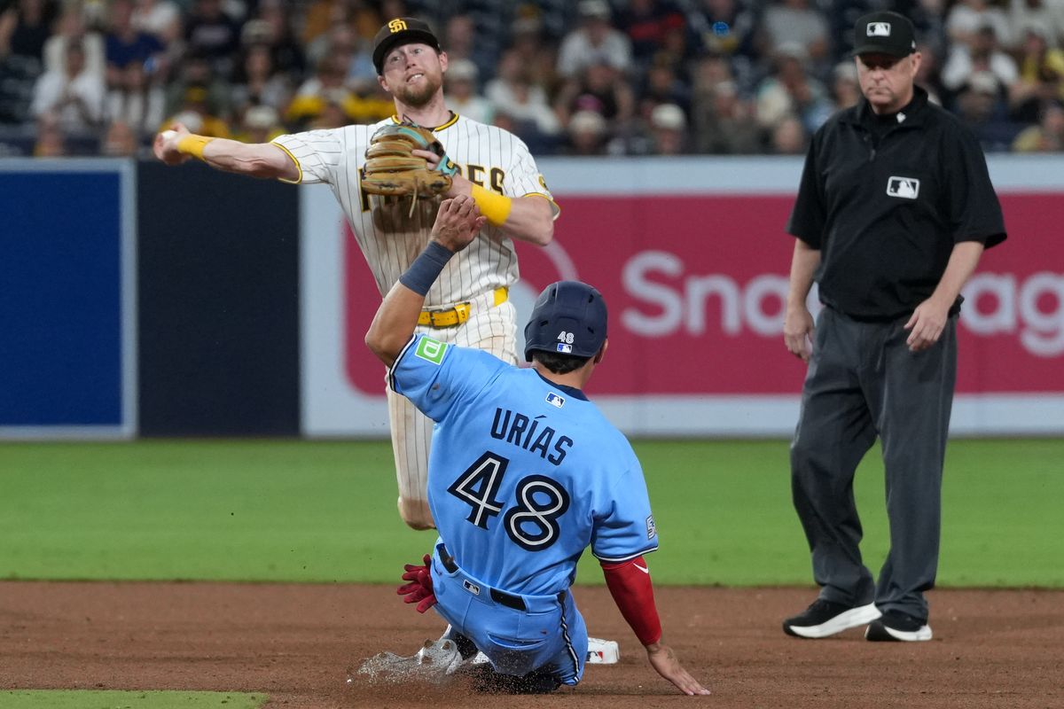 Blue Jays second baseman Luis Urias (48) slides to second base during an MLB baseball game against the Padres, Saturday July 11, 2026 in San Diego, California. Blue Jays second baseman Luis Urias (48) slides to second base during an MLB baseball game against the Padres, Saturday July 11, 2026 in San Diego, California.