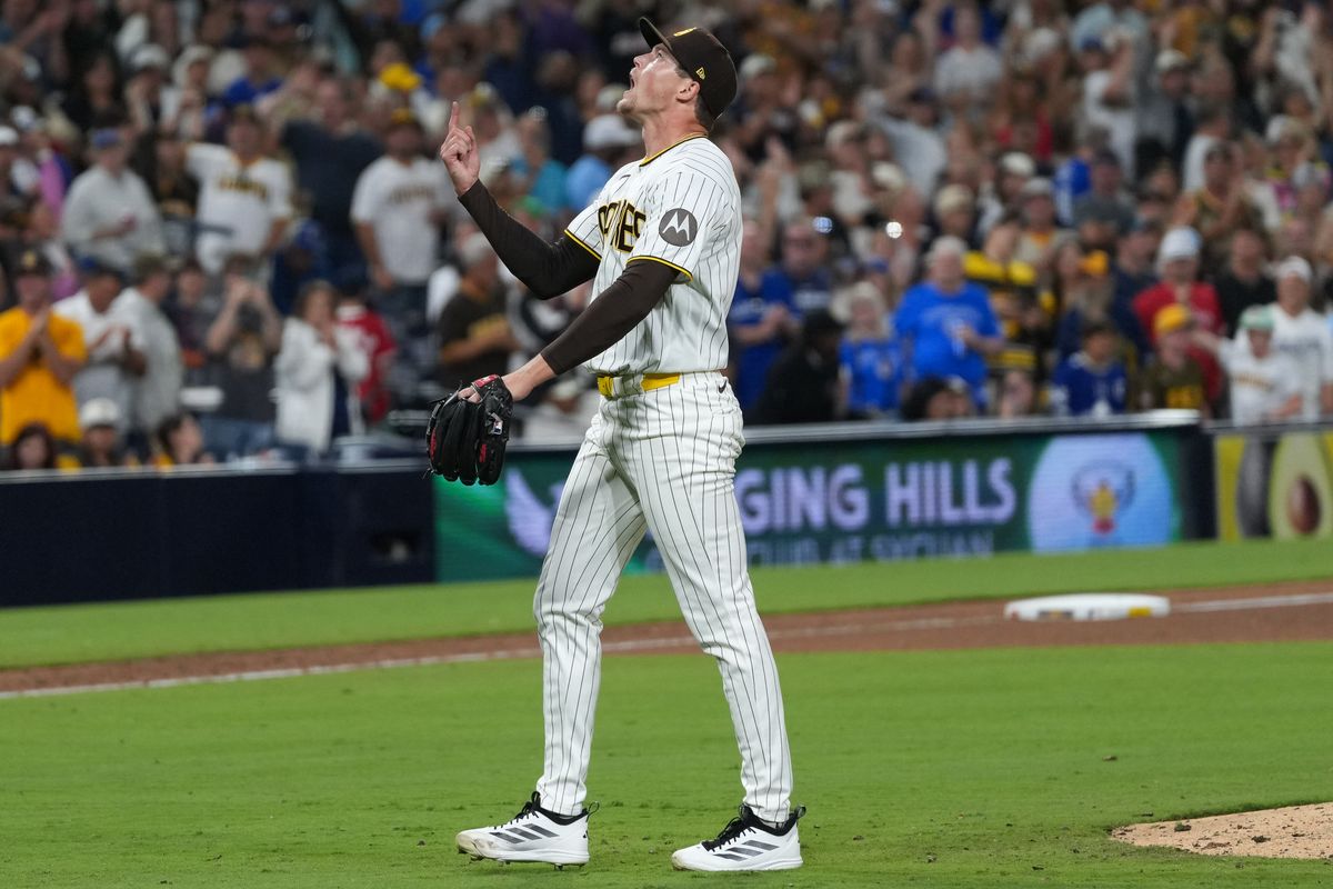 Padres relief pitcher Mason Miller (22) celebrates after striking out a batter during an MLB baseball game against the Blue Jays, Saturday July 11, 2026 in San Diego, California. Padres relief pitcher Mason Miller (22) celebrates after striking out a batter during an MLB baseball game against the Blue Jays, Saturday July 11, 2026 in San Diego, California.