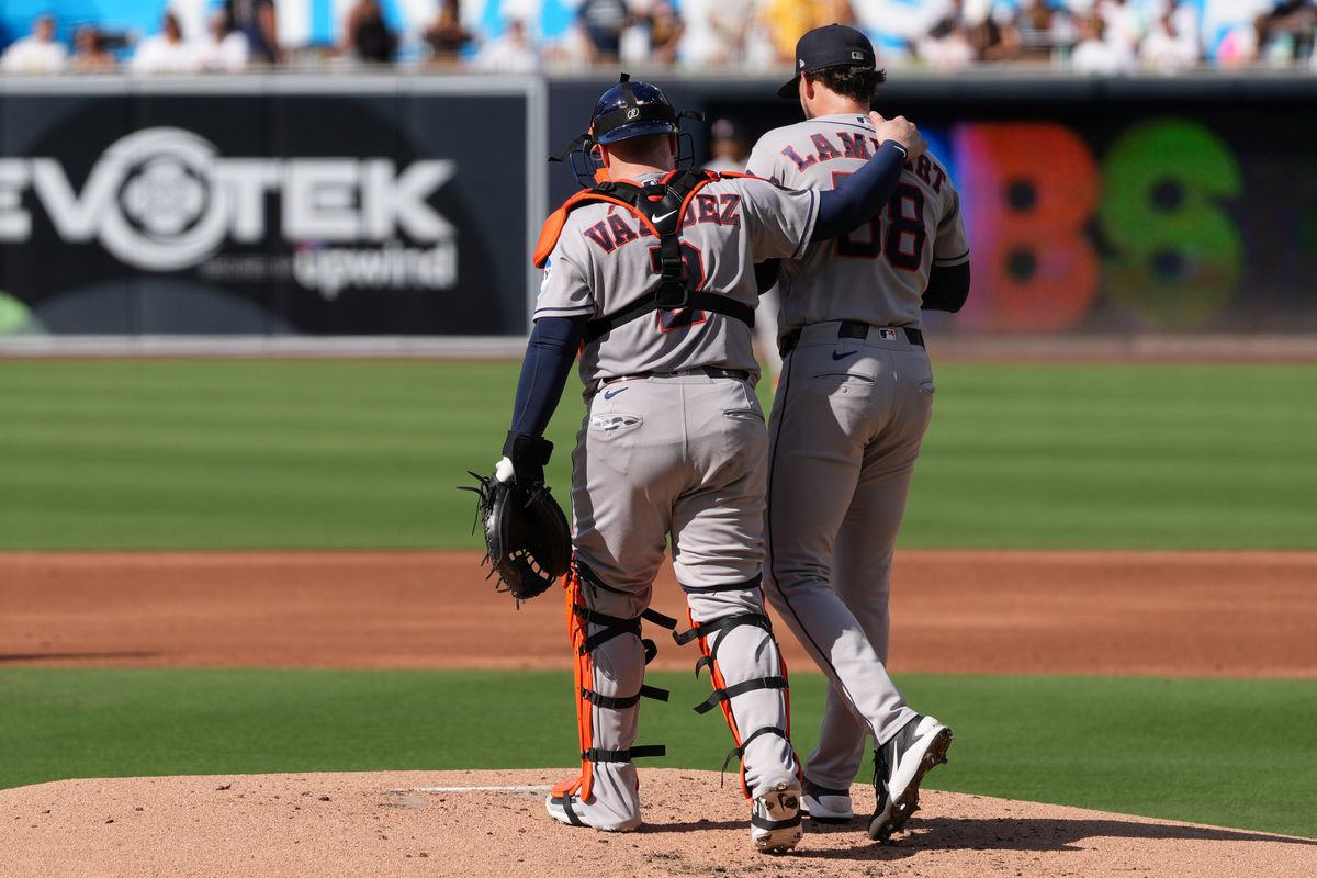 Astros catcher Christian Vazquez (2) talks at the mound with Astros starting pitcher Peter Lambert (38) during an MLB baseball game against the Padres, Saturday August 08, 2026 in San Diego, California. Astros catcher Christian Vazquez (2) talks at the mound with Astros starting pitcher Peter Lambert (38) during an MLB baseball game against the Padres, Saturday August 08, 2026 in San Diego, California.