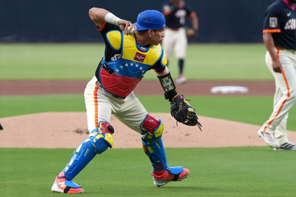 Padres catcher Freddy Fermin (54) throws to first base during an MLB baseball game against the Twins, Friday August 21, 2026 in San Diego, California. Padres catcher Freddy Fermin (54) throws to first base during an MLB baseball game against the Twins, Friday August 21, 2026 in San Diego, California.