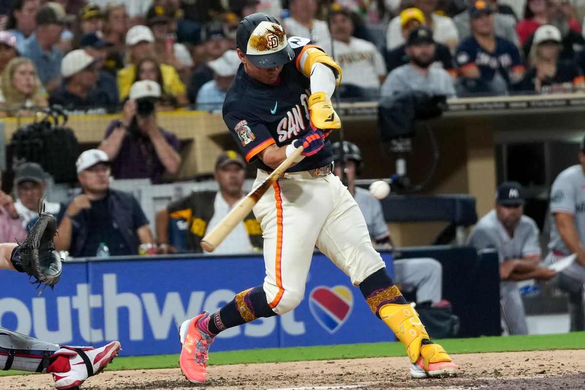 Padres catcher Freddy Fermin (54) hits the ball during an MLB baseball game against the Twins, Friday August 21, 2026 in San Diego, California. Padres catcher Freddy Fermin (54) hits the ball during an MLB baseball game against the Twins, Friday August 21, 2026 in San Diego, California.