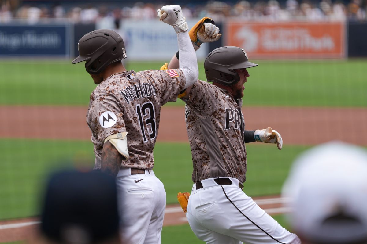 Padres second baseman Jake Cronenworth (9) and Padres third baseman Manny Machado (13) celebrate after hitting a home run during an MLB baseball game against the Yankees, Sunday September 06, 2026 in San Diego, California. Padres second baseman Jake Cronenworth (9) and Padres third baseman Manny Machado (13) celebrate after hitting a home run during an MLB baseball game against the Yankees, Sunday September 06, 2026 in San Diego, California.