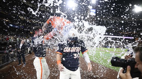 Apr 10, 2026; San Diego, California, USA; San Diego Padres left fielder Gavin Sheets (30) has a cooler dumped over him by center fielder Jackson Merrill (3) after Sheets hit a walk off three-run home run during the ninth inning at Petco Park.