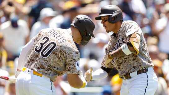Jun 28, 2026; San Diego, California, USA; San Diego Padres third baseman Manny Machado (13) celebrates with first baseman Gavin Sheets (30) after hitting a one run home run during the fourth inning against the Los Angeles Dodgers at Petco Park.