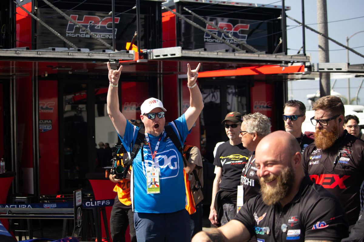 A fan cheers on the returning teams at the Friday practice sessions at the 2025 Acura Grand Prix of Long Beach. 