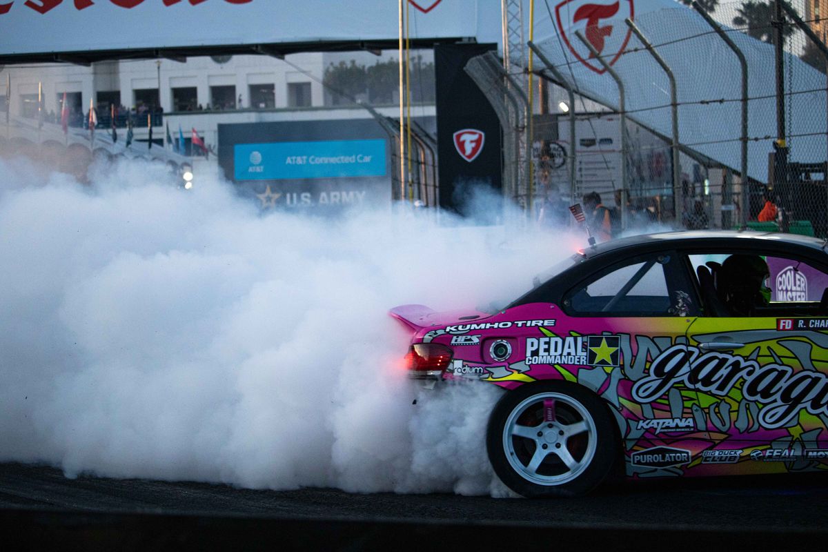 Rome Charpentier's car stirs up smoke during the SuperDrift Challenge #2 at the 2025 Acura Grand Prix of Long Beach.