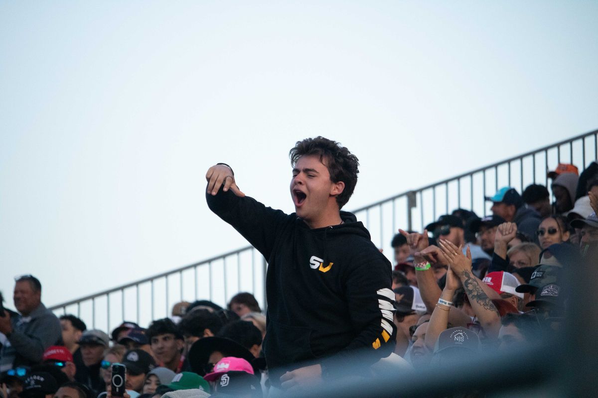 A fan gets excited in the crowd during SuperDrift Challenge #2 at the 2025 Acura Grand Prix of Long Beach. 