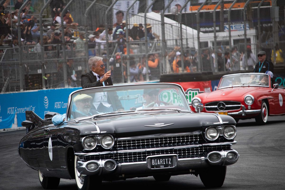 Racing legend Mario Andretti waves to the crowd during the Mothers Exotic Car Parade at the 2025 Acura Grand Prix of Long Beach.