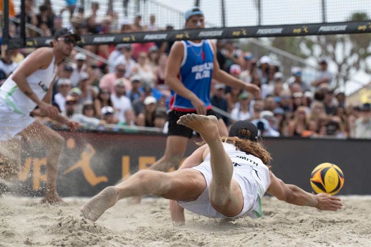 LA Launch's Hagen Smith dives to keep the ball in play during a match between the LA Launch and Brooklin Blaze at AVP Long Beach on Saturday, July 12, 2026 at Alamitos Beach in Long Beach Calif LA Launch's Hagen Smith dives to keep the ball in play during a match between the LA Launch and Brooklin Blaze at AVP Long Beach on Saturday, July 12, 2026 at Alamitos Beach in Long Beach Calif