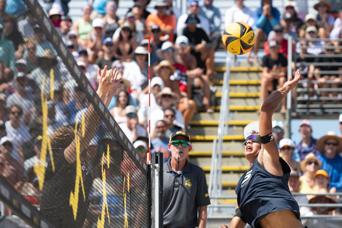 Miles Partain spikes the ball during the 2026 Manhattan Beach Open on Sunday, August 16, 2026 at Manhattan Beach Pier. Miles Partain spikes the ball during the 2026 Manhattan Beach Open on Sunday, August 16, 2026 at Manhattan Beach Pier.