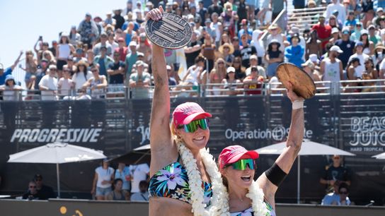 Taryn Brasher and Kristen Cruz hold up their trophies after winning the women's finals during the 2026 Manhattan Beach Open on Sunday, August 16, 2026 at Manhattan Beach Pier. Taryn Brasher and Kristen Cruz hold up their trophies after winning the women's finals during the 2026 Manhattan Beach Open on Sunday, August 16, 2026 at Manhattan Beach Pier.