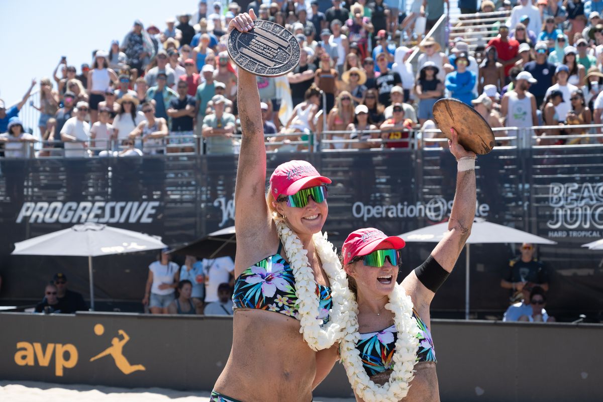 Taryn Brasher and Kristen Cruz hold up their trophies after winning the women's finals during the 2026 Manhattan Beach Open on Sunday, August 16, 2026 at Manhattan Beach Pier. Taryn Brasher and Kristen Cruz hold up their trophies after winning the women's finals during the 2026 Manhattan Beach Open on Sunday, August 16, 2026 at Manhattan Beach Pier.