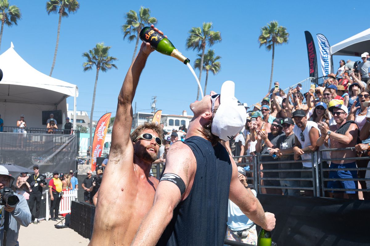 Andy Benesh and Taylor Crabb celebrate winning the men's finals during the 2026 Manhattan Beach Open on Sunday, August 16, 2026 at Manhattan Beach Pier. Andy Benesh and Taylor Crabb celebrate winning the men's finals during the 2026 Manhattan Beach Open on Sunday, August 16, 2026 at Manhattan Beach Pier.