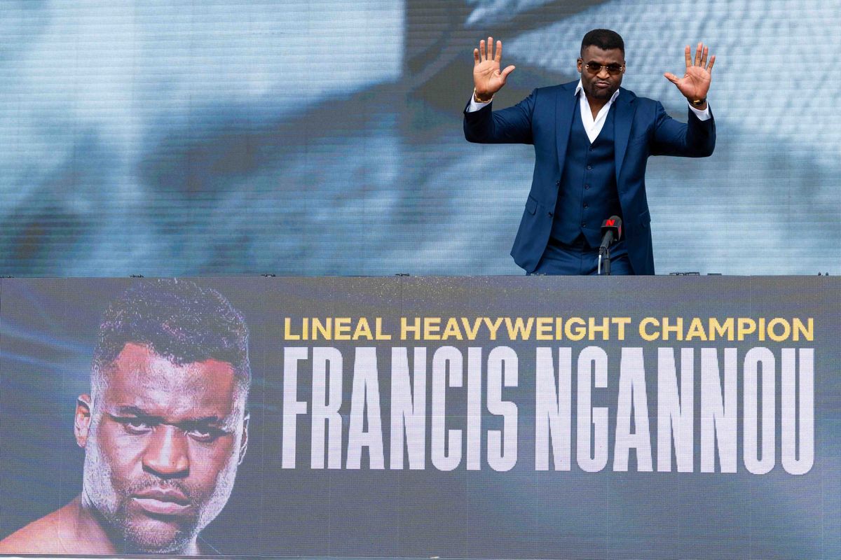 MMA fighter Francis Ngannou waves to the crowd as he is introduced during a pre-fight press conference for a Netflix fight, Tuesday March 10, 2026 in Inglewood, Calif.