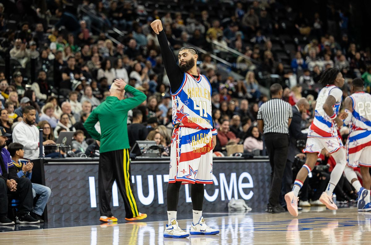 Harlem Globetrotters forward Sweet Lou II Dunbar (41) shoots the ball during a Harlem Globetrotter basketball game against The Washington Generals, Friday February 20, 2026 in Los Angeles.