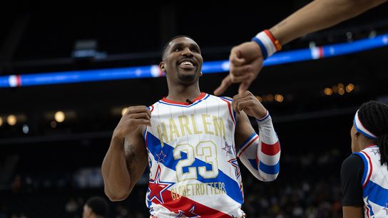 Harlem Globetrotters showman Thunder Law (23) gestures during a Harlem Globetrotters basketball game against The Washington Generals, Friday February 20, 2026 in Los Angeles.