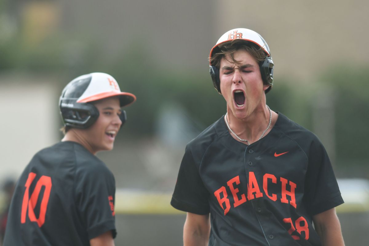Huntington Beach Jared Grindlinger (28) reacts to scoring a run during an High School Baseball game against Temecula Valley Tuesday May 12, 2026 in Temecula, California.