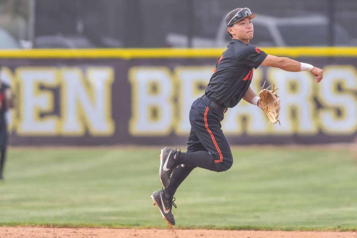 Huntington Beach Sol Moriyama makes a throw to first during an High School Baseball game against Temecula Valley Tuesday May 12, 2026 in Temecula, California.