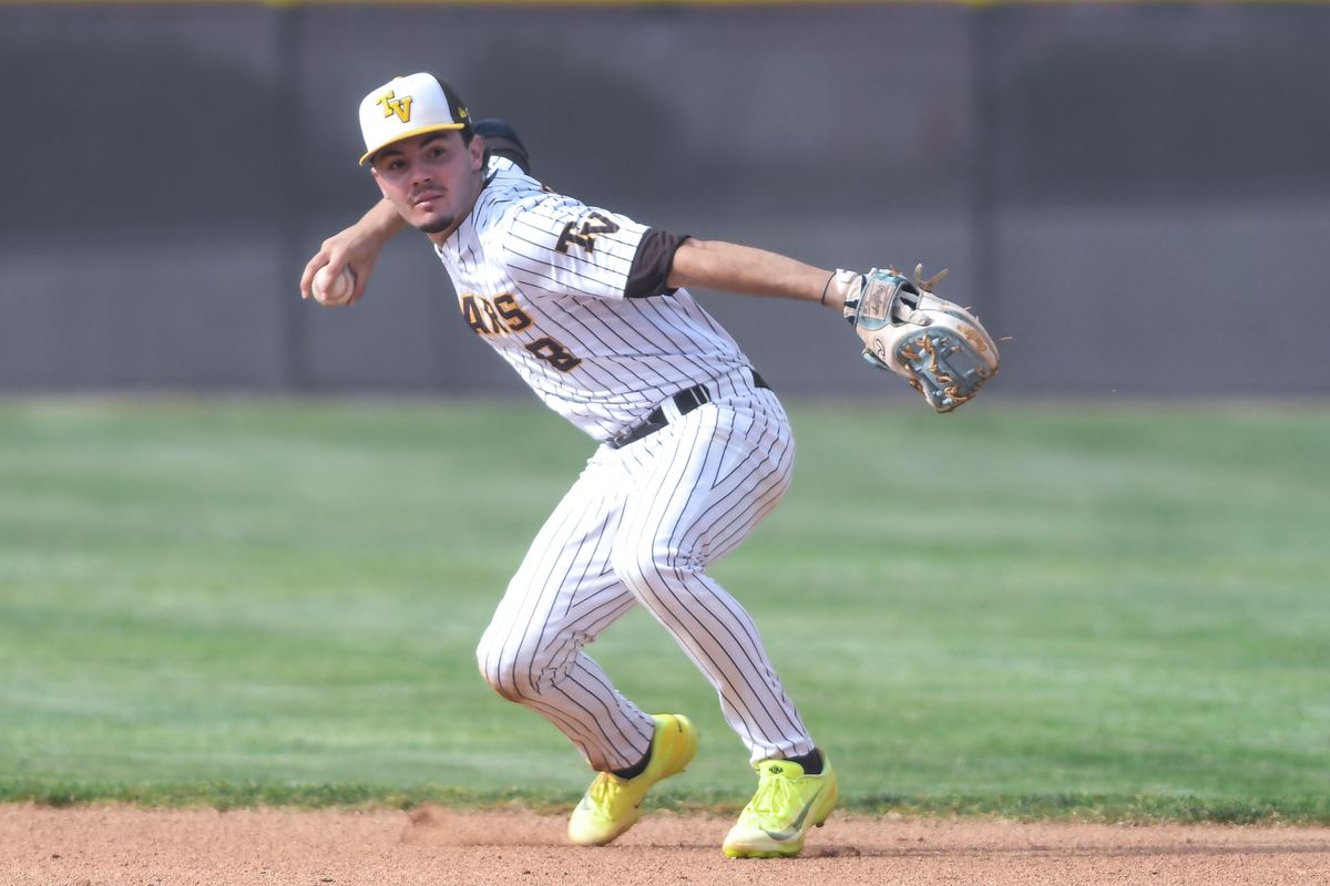 Temecula Valley Rocco Pugliese (8) makes the throw to first during an High School Baseball game against   Huntington Beach Tuesday May 12, 2026 in Temecula, California.