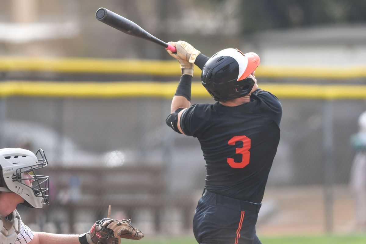 Huntington Beach Owen Bone (3) follows through on a swing during an High School Baseball game against   Temecula Valley Tuesday May 12, 2026 in Temecula, California.