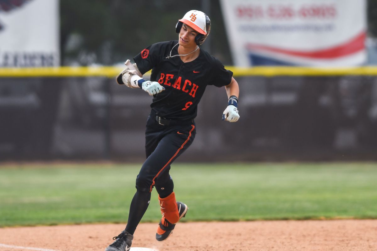 Huntington Beach Elyjah Mason (9) rounds the bases following hitting a homer during an High School Baseball game against Temecula Valley Tuesday May 12, 2026 in Temecula, California.
