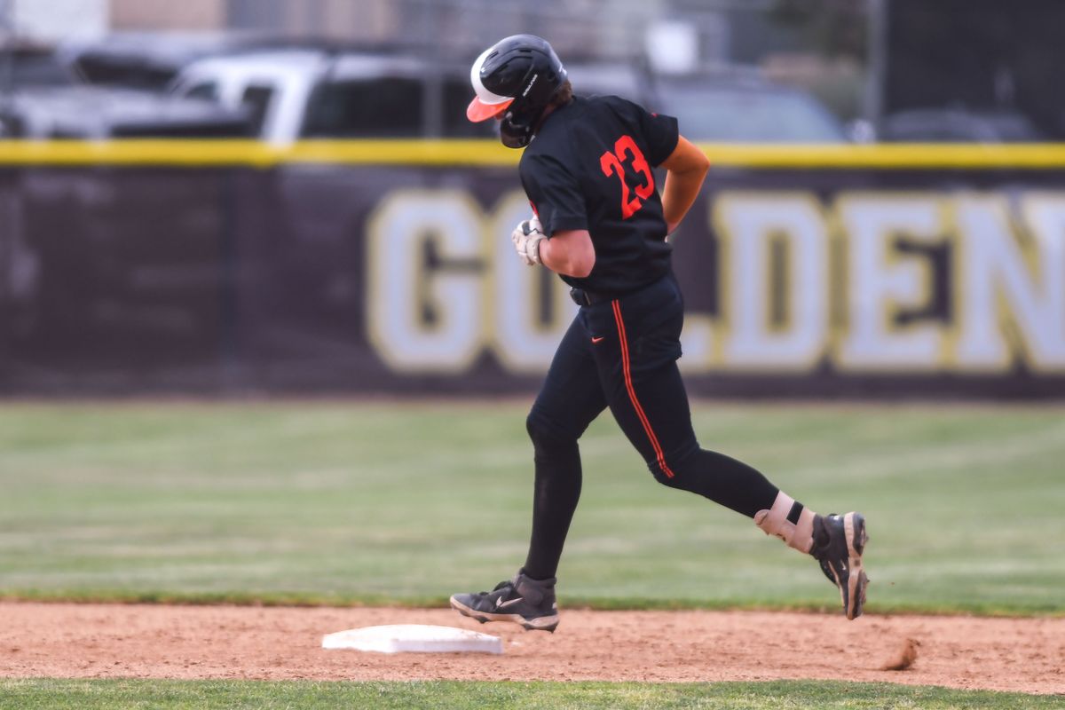 Huntington Beach Dane Cunningham (23) trots around the bases following hitting a homer during an High School Baseball game against   Temecula Valley Tuesday May 12, 2026 in Temecula, California.
