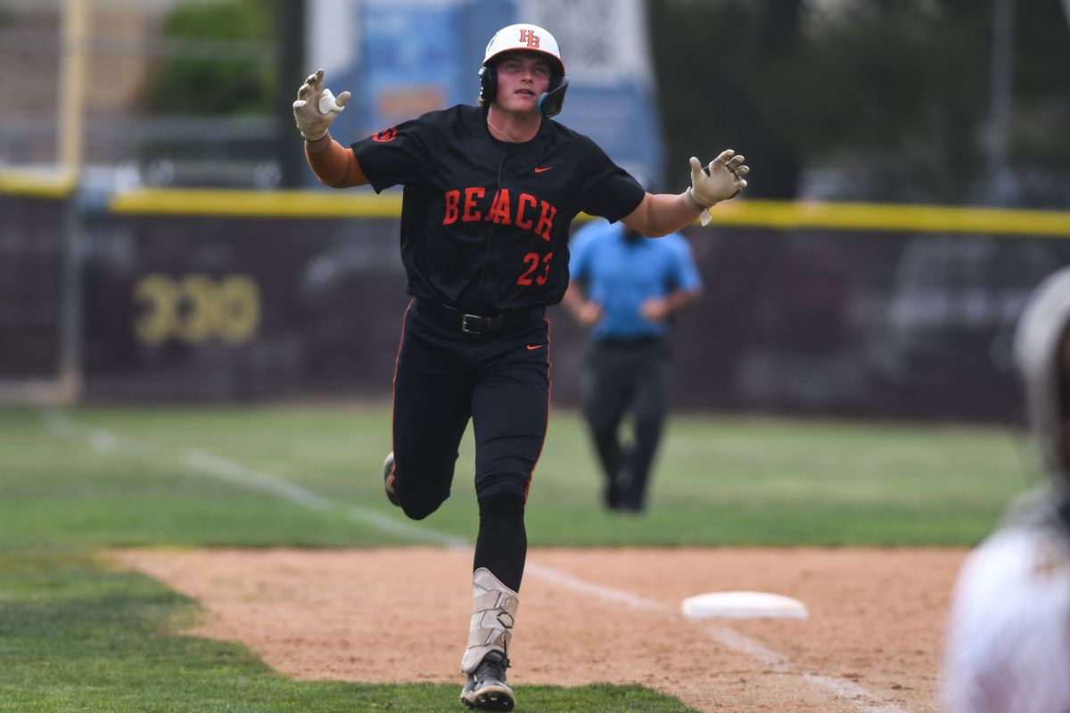 Huntington Beach Dane Cunningham (23) trots around the bases following hitting a homer during an High School Baseball game against   Temecula Valley Tuesday May 12, 2026 in Temecula, California.